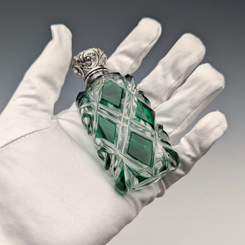 Antique British silver-lidded green cut glass portable perfume bottle